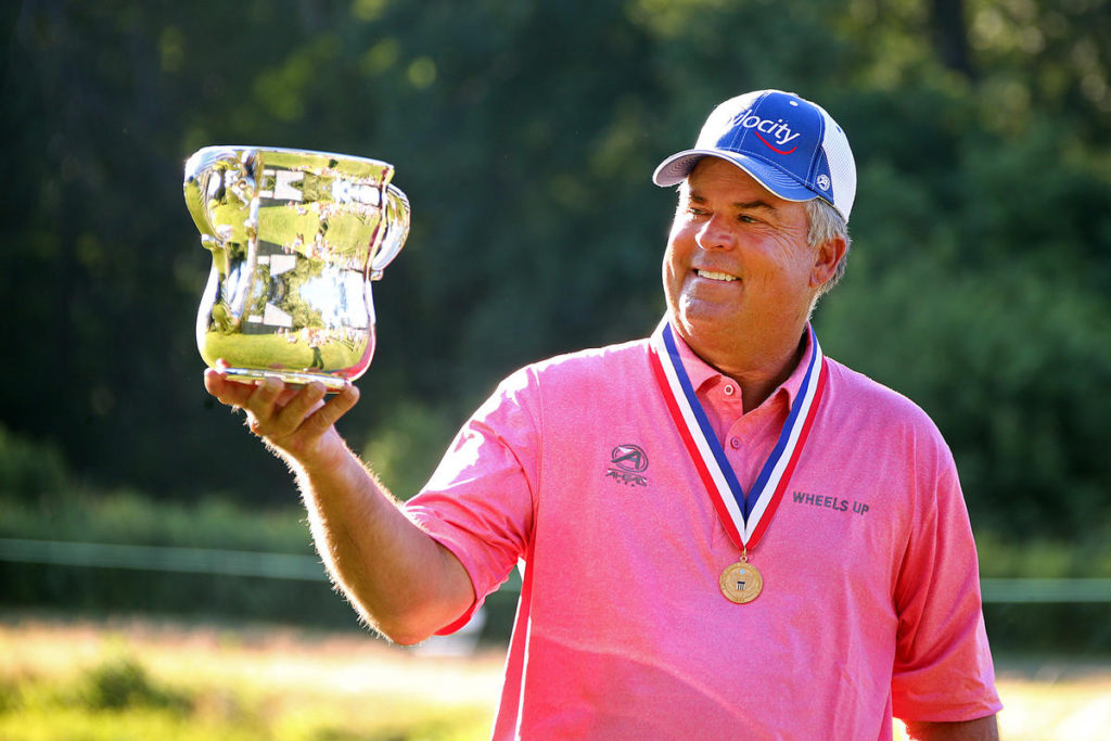 (070217 Peabody, MA) Kenny Perry winner of the the US Senior Open holds up the Francis D. Ouimet Trophy at the Salem Country Club in Peabody on Sunday, July 2, 2017. Staff Photo by Nancy Lane