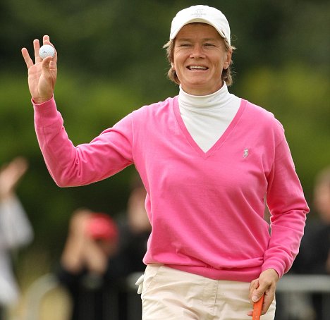 Scotland's Catriona Matthew waves to the crowd around the 18th green after score of -3 during the Women's British Open at Royal Lytham and St Anne's Golf Course, Blackpool. PRESS ASSOCIATION Photo. Picture date: Friday July 31, 2009. Photo credit should read: Nick Potts/PA Wire. RESTRICTIONS: Use subject to restrictions. Editorial use only. No commercial use. Call +44 (0)1158 447447 for further information.