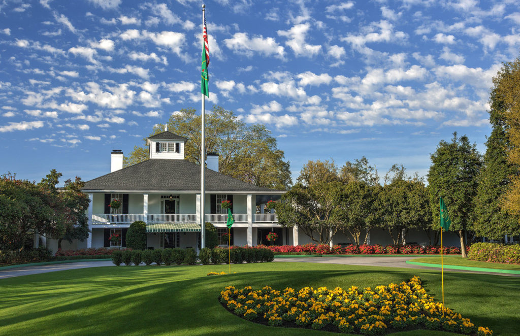 A blue sky frames the Clubhouse and Founders Circle at Augusta National Golf Club on Wednesday, April 2, 2014.